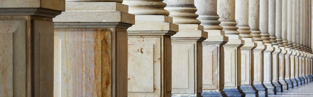 Row of marble columns on pedestals as part of a federal building